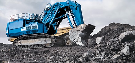 blauer Bagger im Bergbau