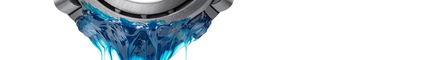 Lager eingetaucht in blaues Schmierfett Lager eingetaucht in blaues Schmierfett