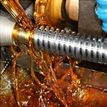 Maschinengetriebe mit multifunktionalem, löslichem Kühlschmierstoff Maschinengetriebe mit multifunktionalem, löslichem Kühlschmierstoff