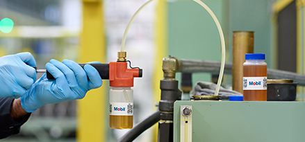 Mobil engineer a sample for Mobil Lubricant Analysis