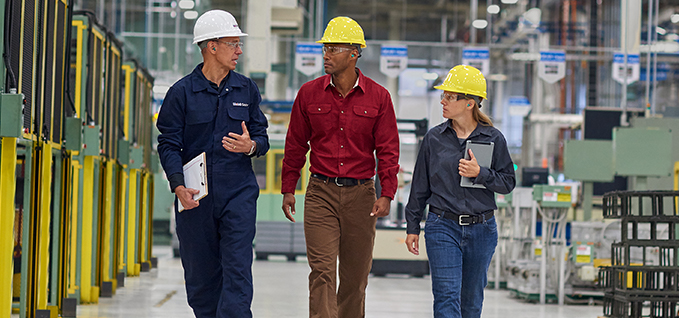 mobil serv workers walking in facility